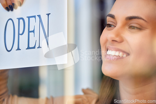 Image of Open sign, happy woman or small business owner with shopping, customer service and retail startup career. Entrepreneur, manager or person smiling with board for welcome in new store at window or door