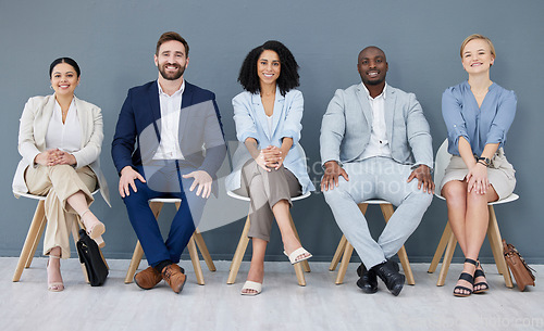 Image of Business, portrait and people in row waiting for interview, meeting or opportunity together. Smile, diversity group sitting in line for hiring, recruitment or recruiting candidates of human resources