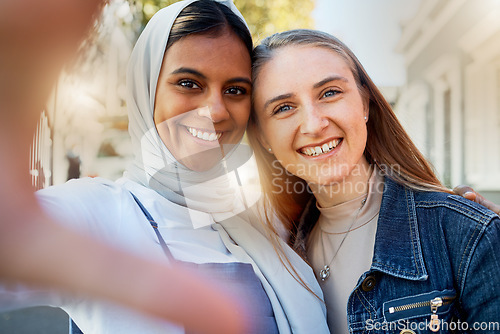 Image of Selfie, friends and girls, hug and outdoor with happiness, reunion and cheerful together. Portrait, muslim women and ladies embrace for picture outside, bonding and travel for quality time and joy