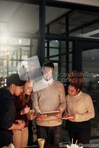 Image of Night business, people and planning on tablet technology for teamwork, research or collaboration in dark office. Diversity, digital strategy and working late online in designer agency of job deadline