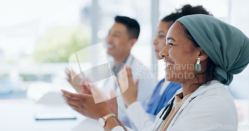 Image of Applause, success and winner with doctors in meeting for presentation, medical and research. Training, healthcare and diversity with group of people in workshop event for medicine, target or teamwork