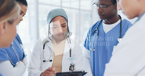 Image of Doctor, people and tablet in meeting, surgery planning or treatment feedback in Islamic research hospital. Talking, diversity and healthcare nurses on technology, teamwork or leadership collaboration