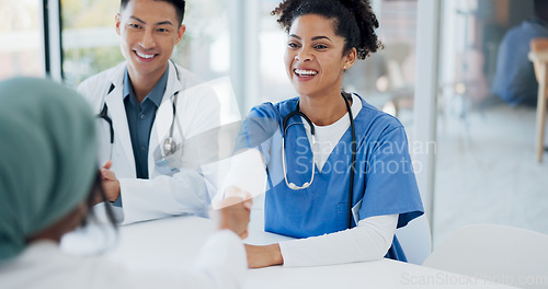 Image of Doctors handshake, welcome and hospital team with applause, onboarding and kindness for new colleagues. Black woman, asian man and muslim medic in clinic, shaking hands and healthcare collaboration