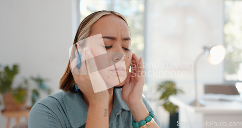 Image of Headache, pain and burnout business woman overworked and thinking in her office feeling stress or depressed. Sad, mental health and female worker or employee feeling unhappy and frustrated