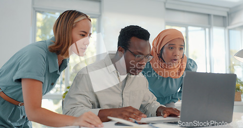 Image of Laptop, good news and team in celebration of success, achievement or teamwork goal in the office. Diversity, celebrate and happy business people celebrating successful collaboration in the workplace.