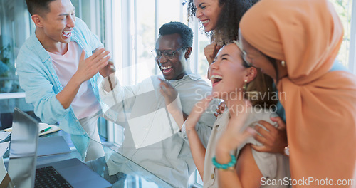 Image of Business people, laptop and high five success in modern office for web design collaboration, goals achievement and celebration. Diversity, happy teamwork and support hands celebrate with tech device