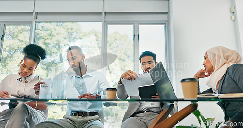 Image of Business people, meeting and planning for strategy, brainstorming or schedule in the boardroom. Group of employee workers sharing ideas in team discussion, project plan or collaboration at the office