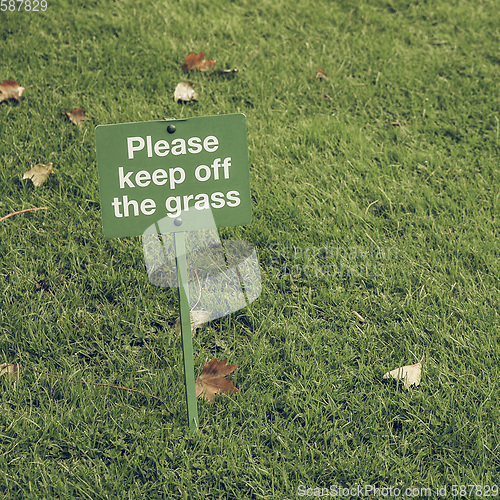 Image of Vintage looking Keep off the grass sign