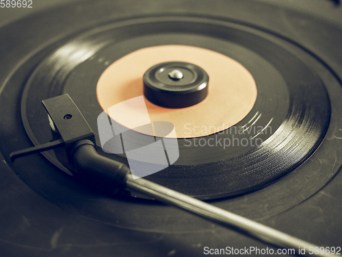 Image of Vintage looking Vinyl record on turntable