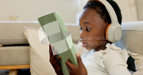 Image of Language learning, headphones and black child with tablet for online education translation website or video call. Relax kid with digital technology listening and speaking for online learning games