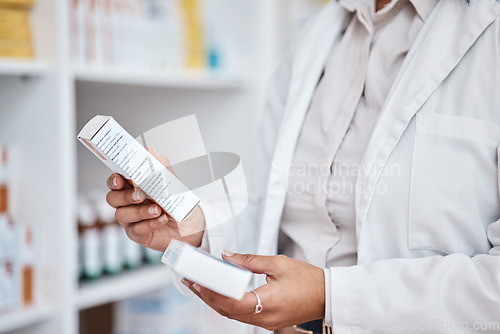 Image of Pharmacy stock check, hands and inventory of medicine and pills. Pharmacist, work and pharmaceutical products ingredient reading in a retail shop or clinic with healthcare and wellness employee