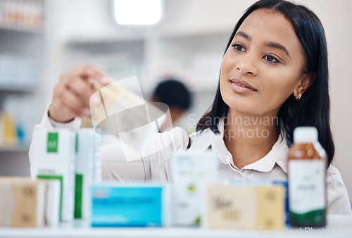 Image of Client, pharmacy and woman with pills, medicine and in store for health, thinking and retail. Medical, female customer and lady with bottles, purchase and shopping for wellness, treatment and product