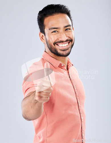 Image of Thumbs up, thanks and like with portrait of man for vote, well done and promotion for good news. Happy, smile and emoji with guy and positive hand gesture for opinion, agreement and approval