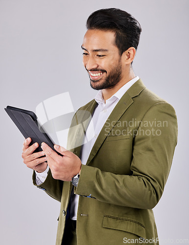 Image of Asian man, search or digital tablet on isolated studio background for finance app, fintech investment or insurance budget. Smile, happy or businessman on technology for stock market or savings growth