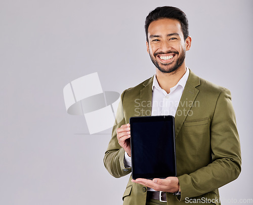 Image of Asian man, portrait or showing tablet screen on isolated studio background for finance mockup, fintech logo or product placement. Smile, happy or businessman on technology, stock market or loan deal