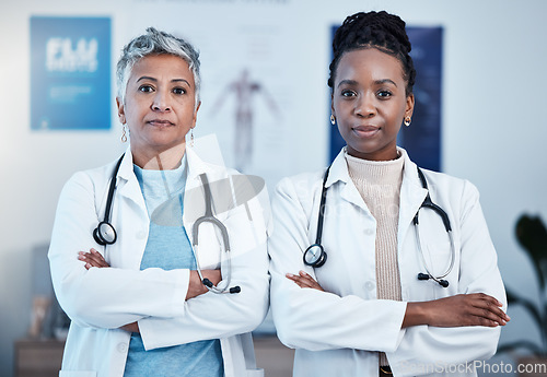 Image of Portrait, serious and proud doctor team in hospital with vision, goal or mindset for innovation. Faces, diversity and women health experts leading with medical, partnership or determination in clinic