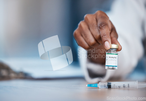 Image of Monkeypox vaccine, medicine and doctor hands with bottle mockup, healthcare or booster vial for disease protection. Medical hospital clinic, pharmacy pharmacist or black woman with virus immunization