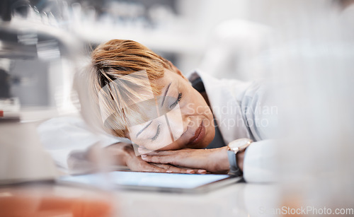 Image of Scientist sleeping, tired and overwork with woman and burnout with insomnia from overtime. Medical research, scientific innovation and senior female in science, fatigue and overwhelmed in laboratory