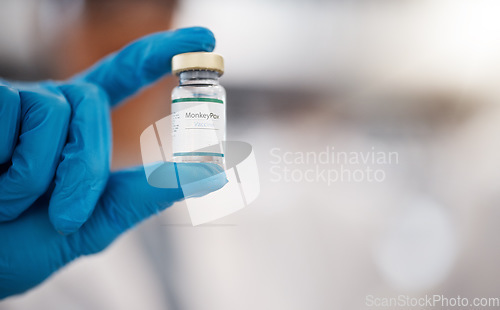 Image of Hands, mockup and monkeypox vaccine in a hospital with a doctor holding a bottle of treatment or cure. Healthcare, medical and research with a medicine professional working in a laboratory