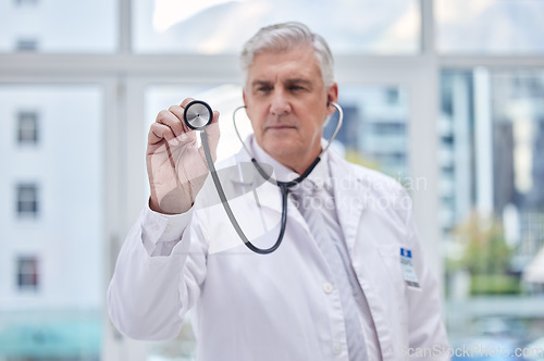 Image of Doctor, stethoscope or listening man in hospital trust, healthcare wellness or life insurance support. Mature, medical or cardiology equipment for clinic worker, surgery expert or lungs professional