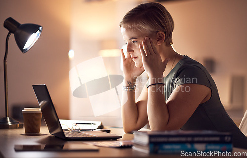 Image of Business woman, headache and computer work at night in a office with project report stress. Working in dark, anxiety and burnout of a corporate worker with a laptop problem and glitch feeling fatigue