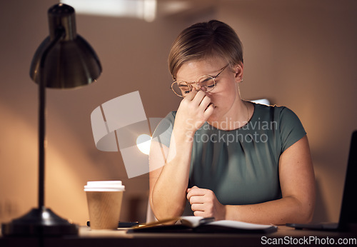 Image of Eye strain, headache and business woman doing computer work at night with report deadline. Working in dark, anxiety and burnout of a corporate worker with a laptop problem and glitch feeling fatigue