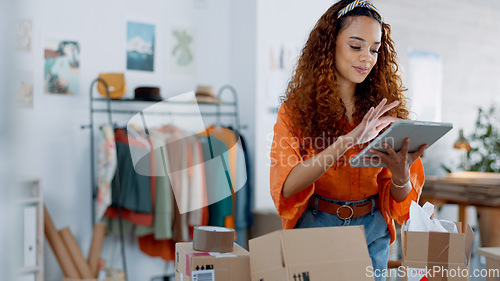 Image of Tablet, logistics and fashion manager with a checklist in retail store clothes or clothing boxes inspection. Entrepreneur, shopping and small business owner writing stock delivery for quality control