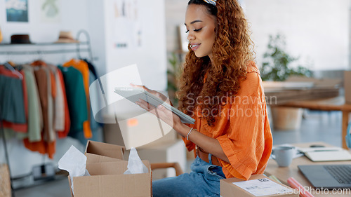 Image of Tablet, logistics and fashion manager with a checklist in retail store clothes or clothing boxes inspection. Entrepreneur, shopping and small business owner writing stock delivery for quality control