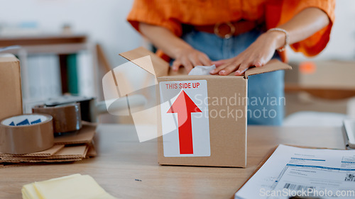 Image of Delivery, packaging and boxes woman hands for courier, shipping and product distribution service in e commerce, supply chain and logistics. Cardboard package and product worker for commercial stock