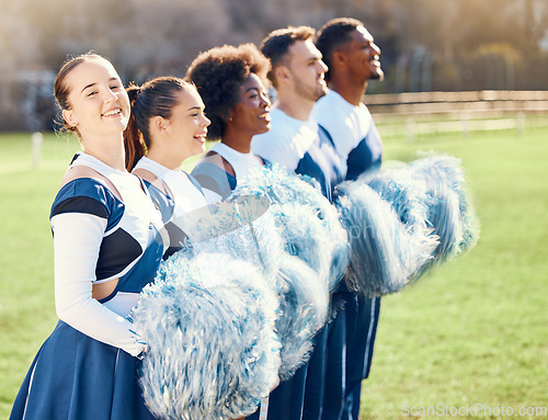 Image of Happy, sports and portrait of a cheerleader with a team for support, formation and motivation. Smile, teamwork and men and women cheering for sport, event or celebration on a field for cheerleading