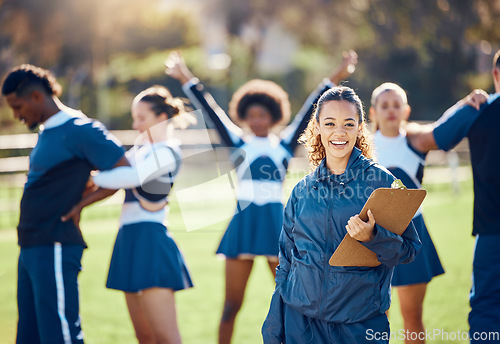 Image of Cheerleader team, woman portrait and training coach with clipboard for practice, sports management and competition. Happy black woman or cheerleading checklist for coaching group of people outdoor