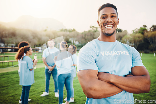 Image of Man in portrait, volunteer and happy with eco friendly help, environment and sustainability, green and waste management. Cleaning, charity and team leader with happiness and community service