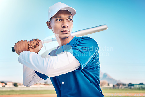 Image of Sports, baseball and serious man with bat on field ready to hit ball in game, practice and competition. Fitness, motivation and male athlete outdoors for exercise, training and workout for match