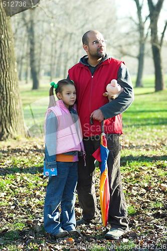 Image of child and father in the park 