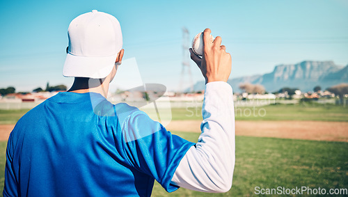 Image of Sports athlete, baseball field or man with ball for competition, practice match or pitcher training workout. Softball, grass pitch or back view of player doing fitness, exercise or pitching challenge