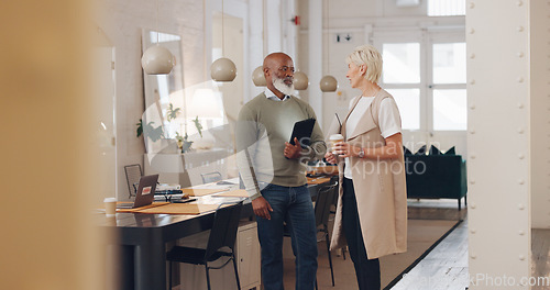 Image of Elderly, creative business people and tablet in project discussion, planning or corporate startup. Senior man and woman having a walk and talking in conference or boardroom