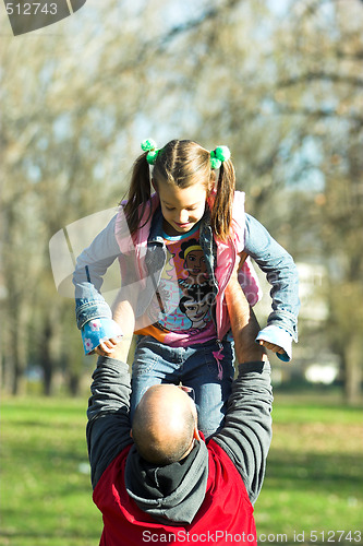 Image of child happy running to father