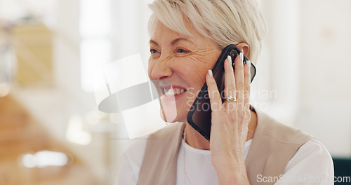 Image of Senior woman, work and home with phone call, communication and laptop on desk for online crm job. Mature worker, home office and using phone for conversation, discussion or negotiation with client