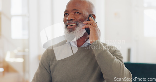 Image of Senior black man, work and home with phone call, communication and laptop on desk for online crm job. Mature worker, home office and mobile for conversation, discussion or negotiation with client