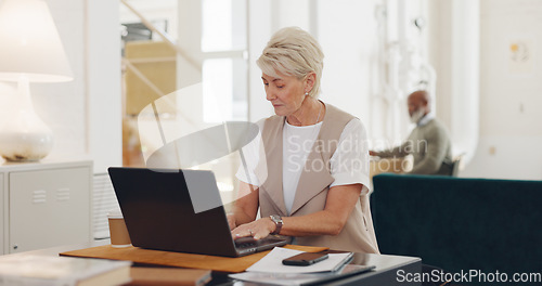 Image of Senior woman, home office and phone call with laptop, smile and focus on communication on internet. Corporate lady, computer and using phone for working from home in management, HR and reading email