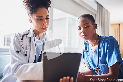 Image of Tablet, black people or nurses reading news, medical research or tests results in hospital together. Teamwork, digital media or African doctors planning or speaking of healthcare report on website