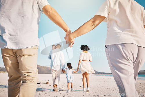 Image of Holding hands, beach family and people walk, bond or enjoy quality time together for vacation, holiday peace or freedom. Sea water, ocean love and back view of couple travel on Sydney Australia sand