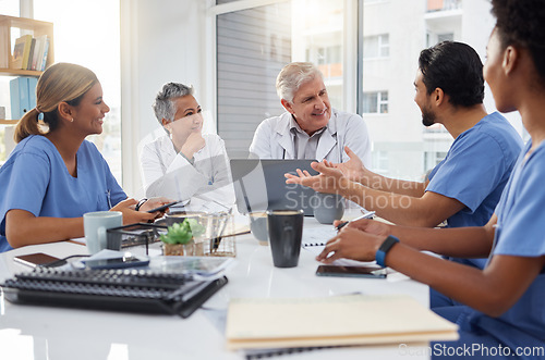 Image of Collaboration, planning or nurses in meeting for a strategy or working in hospital for healthcare together. Team, medical research or senior doctors talking, speaking or helping innovation or ideas