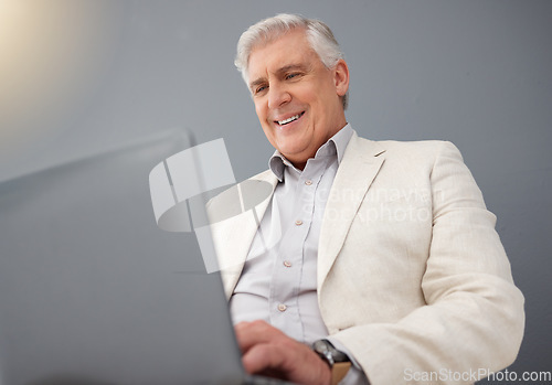 Image of Senior business man, laptop and studio background for planning, online strategy and email website. Happy executive ceo working on computer technology, corporate management and professional smile