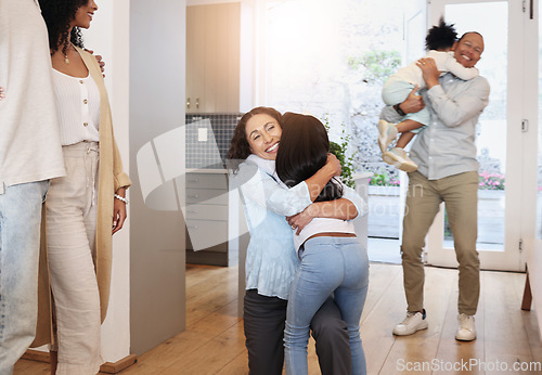 Image of Hug, happy and family in a house for a visit, excited and showing affection. Smile, affectionate and grandparents hugging children, bonding and reunited while visiting during retirement together
