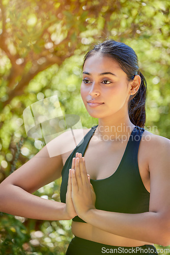 Image of Yoga, praying hands and woman in nature for wellness, balance and peace on bokeh background. Pose, meditation and girl in countryside for mental health, zen and mindset, pilates and chakra workout