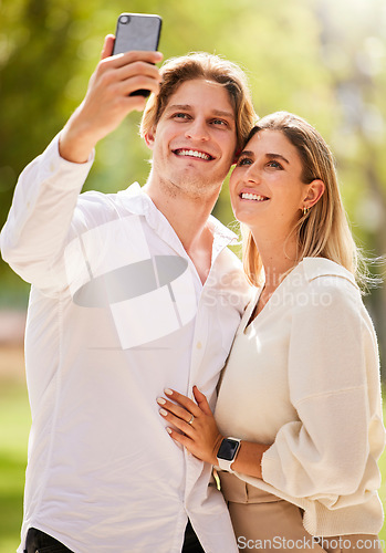 Image of Couple, selfie and happiness outdoor for love, care and smile together in nature garden for social media. Happy man, young woman and take photograph in park for holiday, date and relax in summer