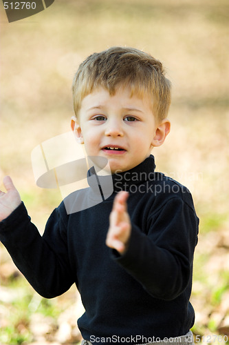 Image of boy clapping