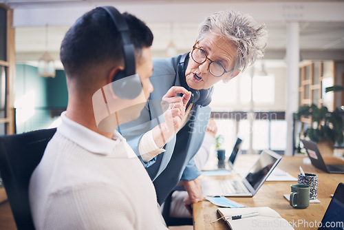 Image of Call center, customer service and leader training man explaining or talking online in telemarketing training. Senior woman, help or sales people in communication at customer services or support desk