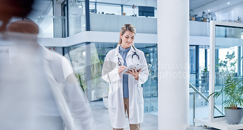 Image of Busy, woman and doctor with tablet, lobby and connection for research, online reading and healthcare. Medical professional, female employee and lady with device, telehealth and touchscreen in clinic